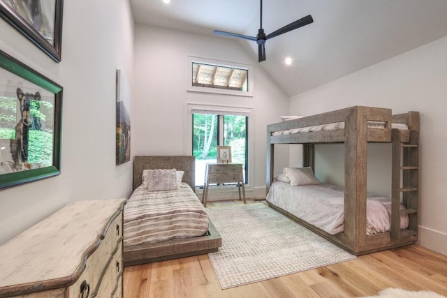 bedroom featuring high vaulted ceiling, light wood-type flooring, recessed lighting, and a ceiling fan