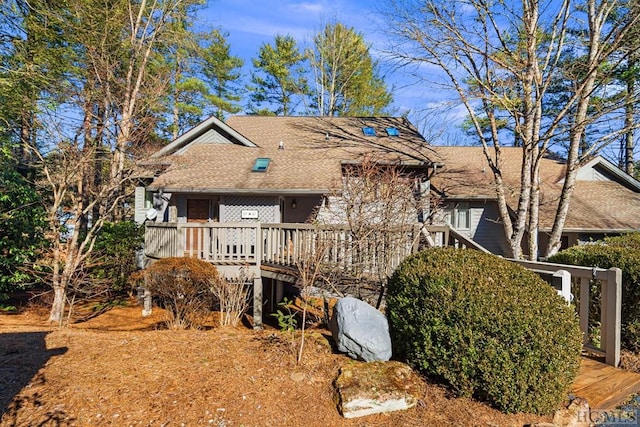 view of front of home with a wooden deck