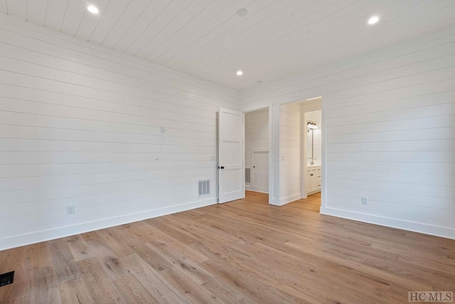 empty room with light wood-type flooring