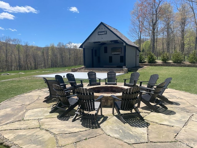 view of patio featuring an outdoor fire pit