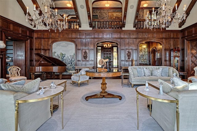 581 Sagee Woods Dr, Highlands, NC 28741 - carpeted living area featuring a chandelier, arched walkways, wood walls, beamed ceiling, and a high ceiling
