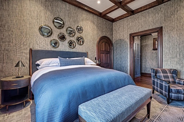581 Sagee Woods Dr, Highlands, NC 28741 - bedroom featuring coffered ceiling, beamed ceiling, and wood finished floors