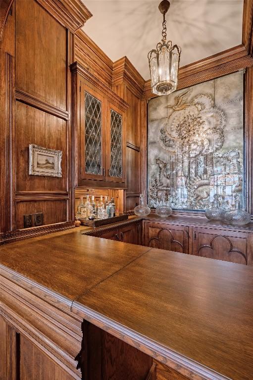 581 Sagee Woods Dr, Highlands, NC 28741 - indoor dry bar with a chandelier, decorative light fixtures, and wooden walls