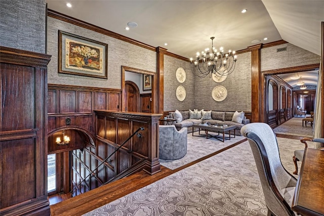 581 Sagee Woods Dr, Highlands, NC 28741 - dining area with a chandelier, crown molding, wood finished floors, wainscoting, and recessed lighting