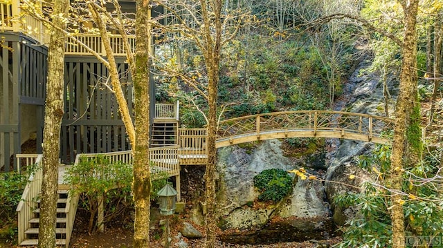 back of house featuring a sunroom