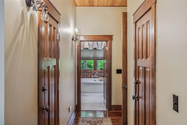18 Buck Knob Is, Glenville, NC 28723 - hall with wood finished floors, wood ceiling, and baseboards