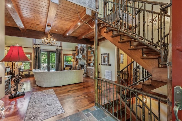 18 Buck Knob Is, Glenville, NC 28723 - living room with a chandelier, wooden ceiling with exposed beams, wood finished floors, and stairs