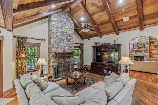 18 Buck Knob Is, Glenville, NC 28723 - living room featuring a stone fireplace, wood finished floors, wood ceiling with exposed beams, a ceiling fan, and high vaulted ceiling