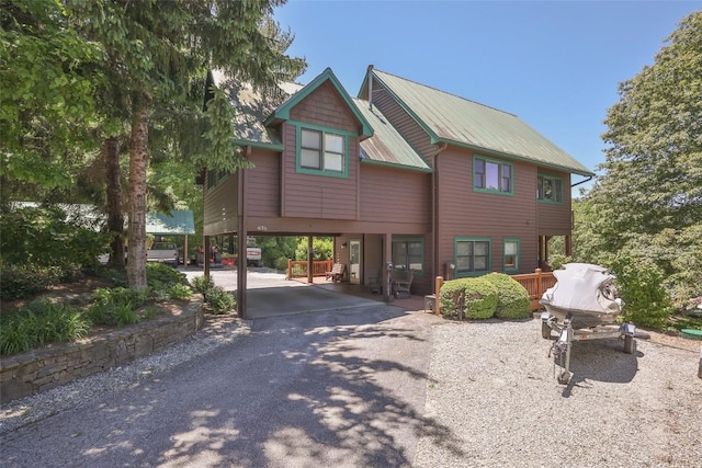 18 Buck Knob Is, Glenville, NC 28723 - view of front of house featuring a carport, driveway, and metal roof