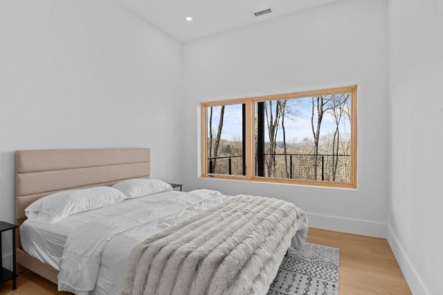 99 Springhead Trl, Cullowhee, NC 28723 - bedroom with light wood finished floors, baseboards, visible vents, and recessed lighting