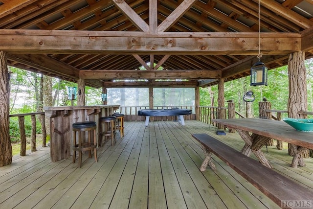 deck with a gazebo and an outdoor bar