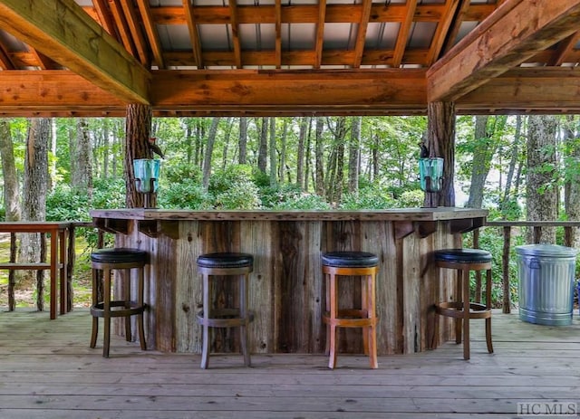 exterior space with vaulted ceiling and light wood-type flooring