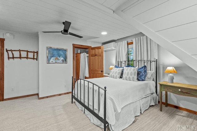 bedroom with wooden ceiling, a wall mounted AC, light colored carpet, and ceiling fan