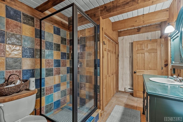 bathroom with tile patterned floors, beam ceiling, vanity, wood walls, and a shower with door