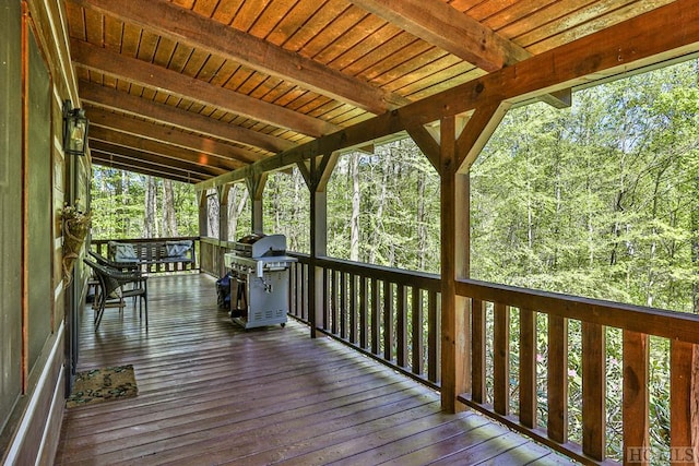 wooden deck with grilling area