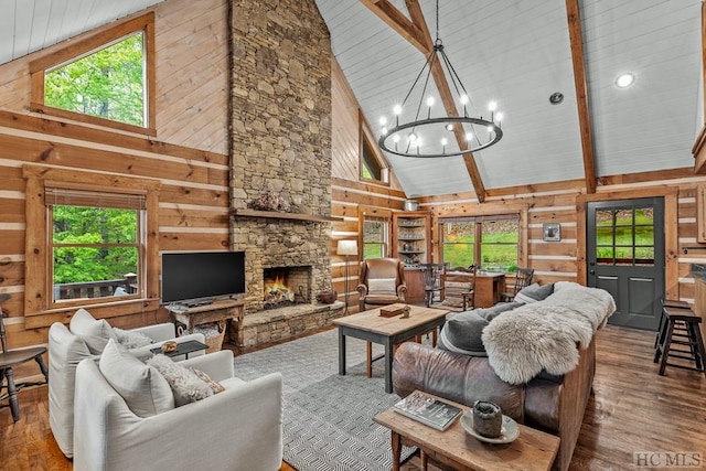 living room featuring high vaulted ceiling and wooden walls