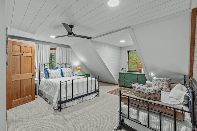 carpeted bedroom with wood ceiling, ceiling fan, and vaulted ceiling