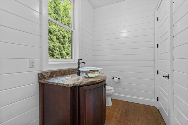 57 Loch Dr, Glenville, NC 28736 - half bathroom featuring wood finished floors, vanity, and wooden walls