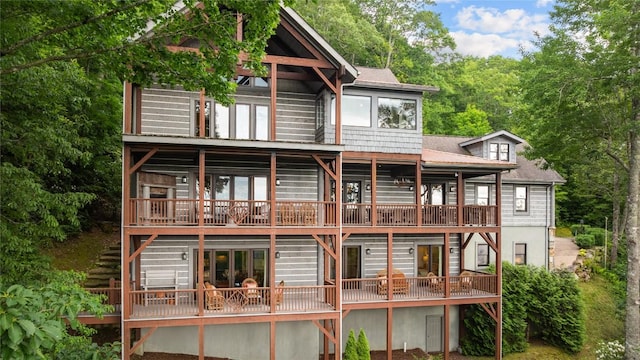 57 Loch Dr, Glenville, NC 28736 - rear view of house with stairway and a deck