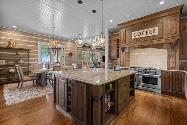 57 Loch Dr, Glenville, NC 28736 - kitchen featuring double oven range, open shelves, a kitchen island with sink, dark wood-style floors, and decorative light fixtures