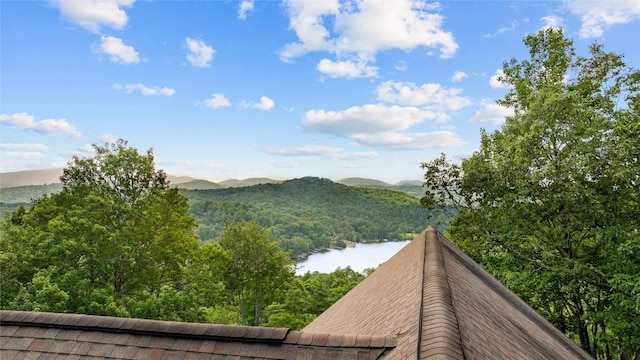 57 Loch Dr, Glenville, NC 28736 - view of mountain backdrop featuring a nearby body of water