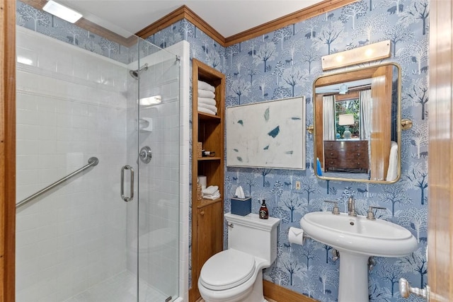 bathroom featuring wallpapered walls, toilet, and a shower stall