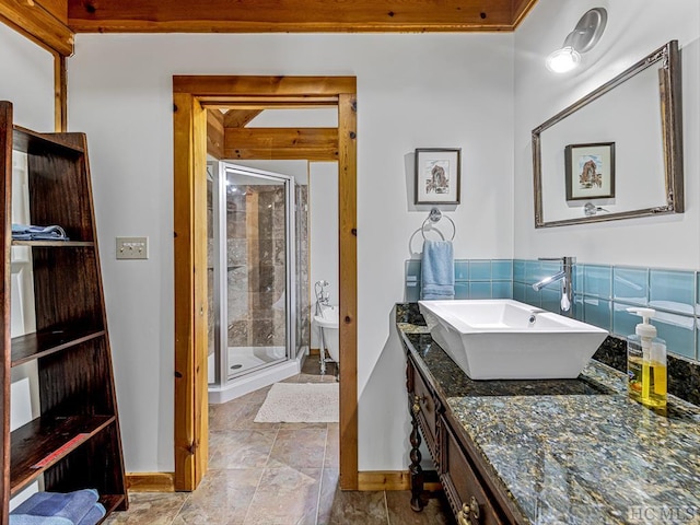 bathroom with vanity, tile patterned flooring, and walk in shower