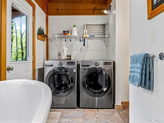 washroom featuring sink and independent washer and dryer