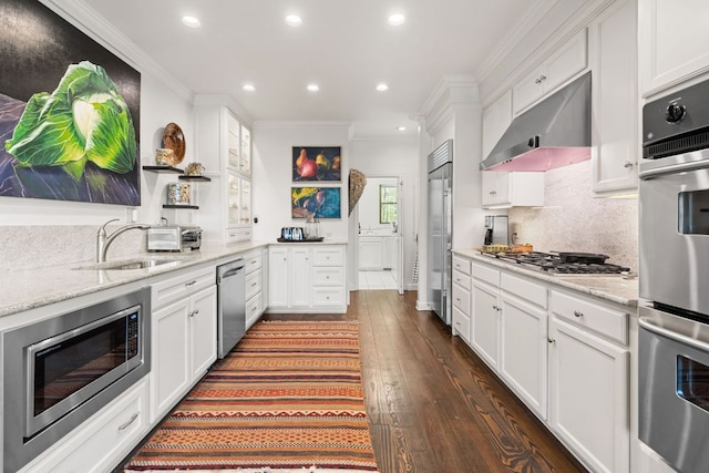 592 Whiteside Mountain Rd, Highlands, NC 28741 - kitchen with open shelves, built in appliances, crown molding, under cabinet range hood, and white cabinets