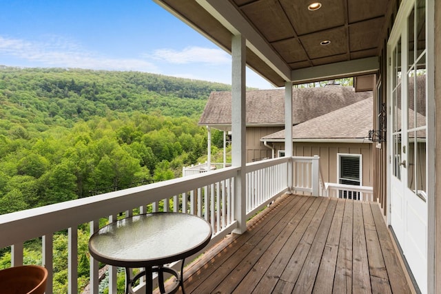 592 Whiteside Mountain Rd, Highlands, NC 28741 - wooden deck featuring a view of trees