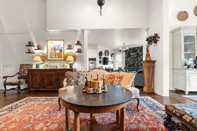592 Whiteside Mountain Rd, Highlands, NC 28741 - living area featuring dark wood-style floors, a chandelier, and a towering ceiling