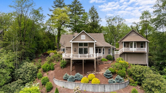 592 Whiteside Mountain Rd, Highlands, NC 28741 - back of property featuring a wooden deck, stairs, and a chimney