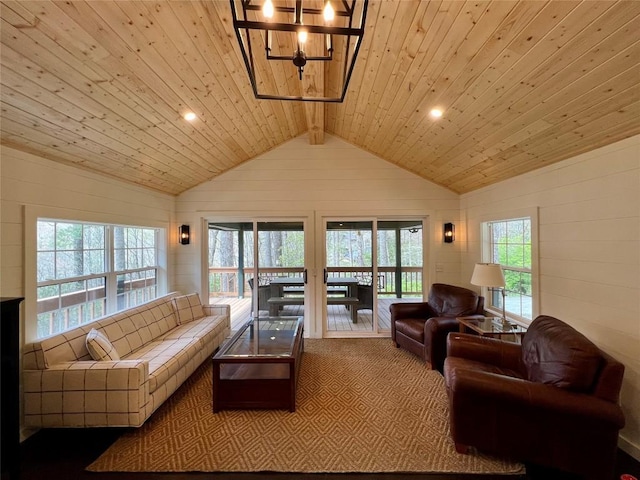 living room featuring wood ceiling and lofted ceiling