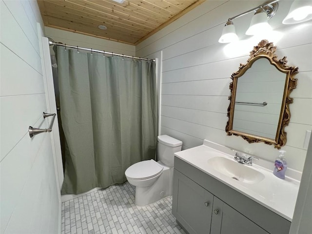 full bathroom with vanity, tile patterned flooring, wood ceiling, wood walls, and toilet