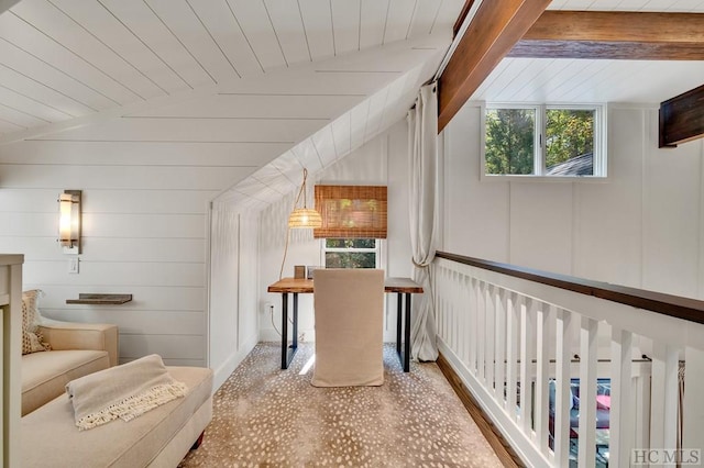 additional living space featuring wooden walls, vaulted ceiling, and wooden ceiling