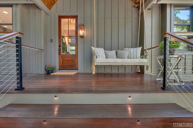 entrance to property featuring covered porch