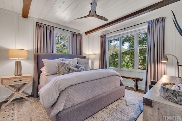 bedroom featuring multiple windows, wood ceiling, ceiling fan, and light wood-type flooring