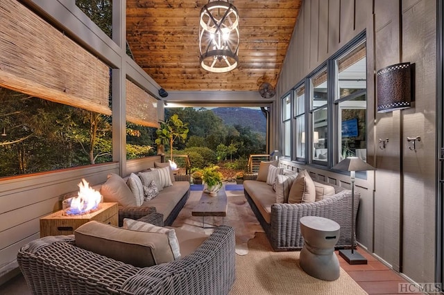 view of patio / terrace featuring an outdoor living space with a fire pit