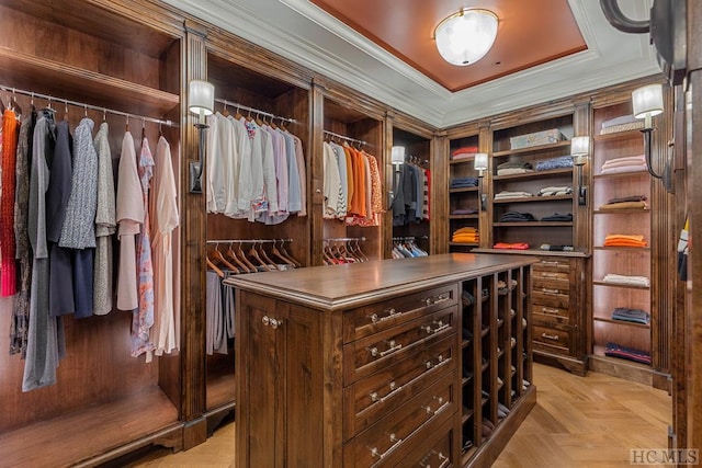 spacious closet with light parquet floors