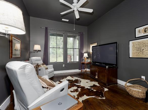 11 Feldspar Ln, Sapphire, NC 28774 - living area with a chandelier, a stone fireplace, recessed lighting, a ceiling fan, and wood finished floors