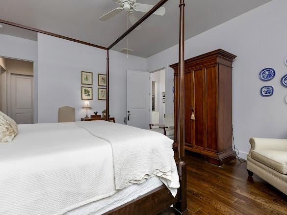11 Feldspar Ln, Sapphire, NC 28774 - bedroom with dark wood-style flooring and a ceiling fan