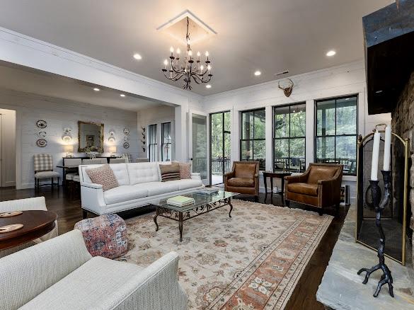 11 Feldspar Ln, Sapphire, NC 28774 - living area with ornamental molding, a chandelier, wood finished floors, and recessed lighting