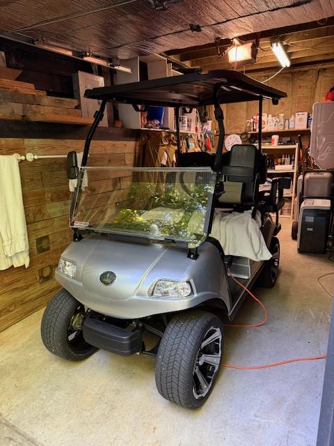 26 S Cumberland Dr, Lake Toxaway, NC 28747 - garage featuring wood walls