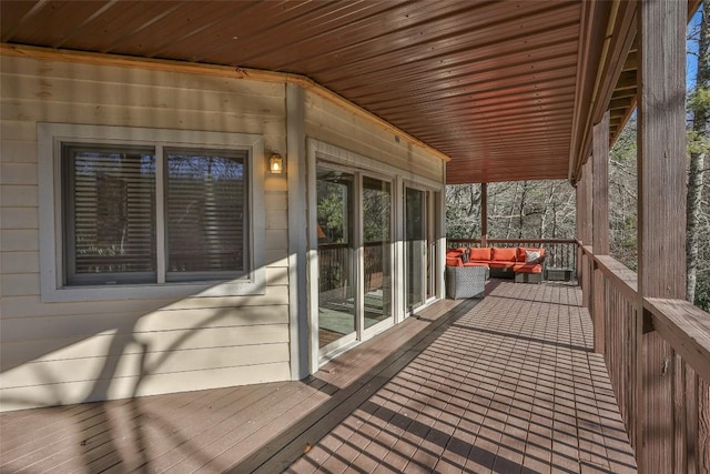 unfurnished sunroom with wooden ceiling