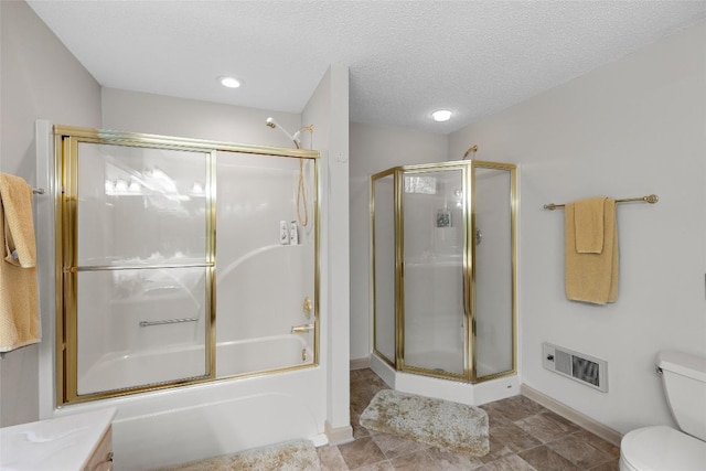 bathroom featuring a textured ceiling, enclosed tub / shower combo, and toilet