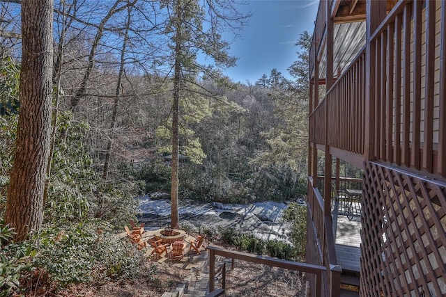 view of yard with an outdoor fire pit