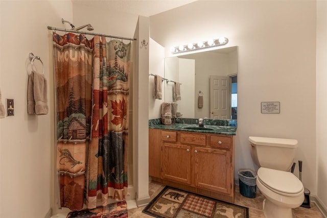 bathroom featuring vanity, toilet, tile patterned flooring, and a shower with shower curtain