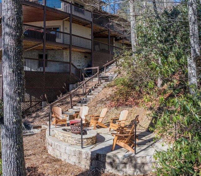 97 Twin Kettle Fls, Glenville, NC 28736 - view of patio featuring stairway, a deck, and an outdoor fire pit