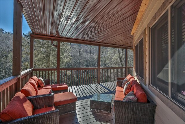 sunroom with wood ceiling