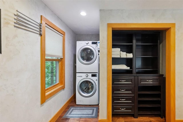 132 Azalea Ct, Sapphire, NC 28774 - laundry room with estacked washer and dryer and wood finished floors